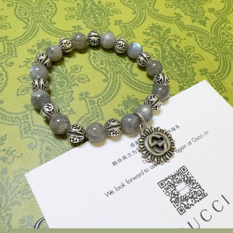 G*u*i bracelets